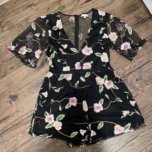 Black floral stitched romper